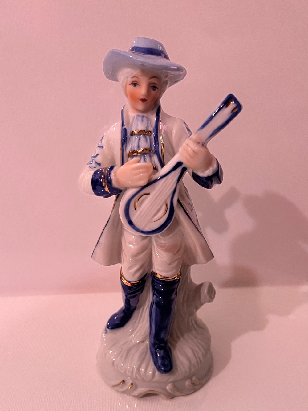 Vintage Porcelain Musician Figurine in White and Blue with Gold Accents